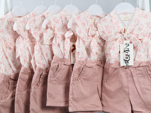Baby Girl’s pink floral bow playsuit